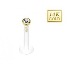 Laget i PTFE med 14 karat gullball med stein