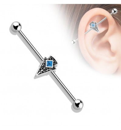 Industriell piercing med tribal og turkise steiner