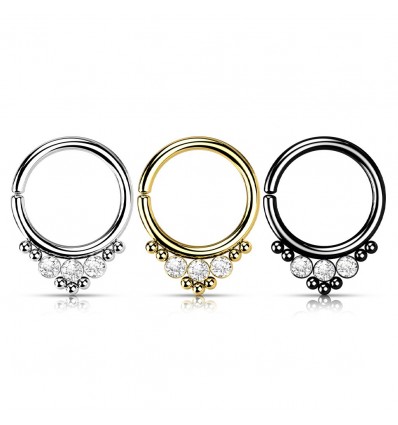 Piercing med 3 steiner og 7 små kuler