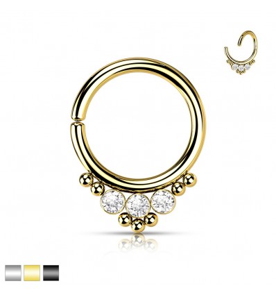 Piercing med 3 steiner og 7 små kuler