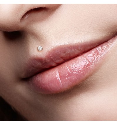 Labret i PTFE med flat rund stein